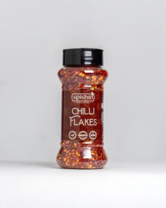 Spishri Chili Flakes – Sun-dried red chili flakes for pizza, pasta, and fiery satvik recipes.