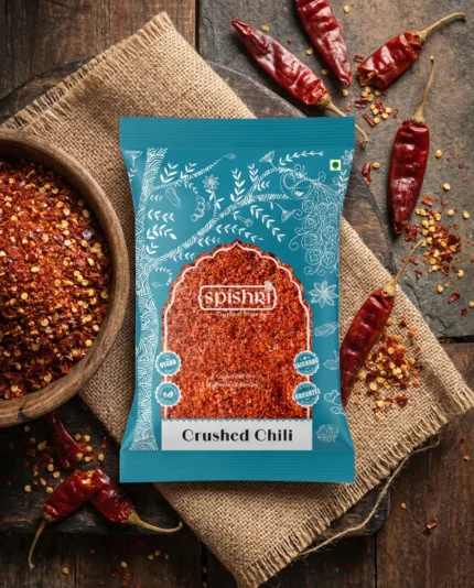 Spishri Premium Red Chili | Crushed & Powdered Short Description Spishri Premium Red Chili is made from carefully selected, naturally sun-dried whole red chilies to deliver bold heat, vibrant color, and authentic flavor. Available in both Crushed and Powdered variants, it contains no artificial colors, preservatives, salt, or fillers, making it a pure choice for everyday Satvik cooking. Product Description Spishri Premium Red Chili is crafted from premium-quality whole red chilies that are naturally sun-dried to preserve their rich color, bold flavor, and authentic aroma. Available in both Crushed and Powdered forms, it lets you choose the perfect texture for every recipe while enjoying pure, uncompromised taste. Our Red Chili contains no artificial colors, preservatives, salt, starch, or fillers. Whether you prefer the coarse texture of crushed chili or the smooth consistency of chili powder, every pack delivers natural heat and vibrant flavor while remaining suitable for Satvik cooking. Key Features Available in Crushed and Powdered variants Made from premium-quality sun-dried whole red chilies Rich natural color and authentic aroma Bold, clean heat with no artificial additives No artificial colors, preservatives, salt, starch, or fillers Suitable for Satvik cooking Hygienically packed to preserve freshness Versatile Uses Sprinkle crushed chili over pizza, pasta, sandwiches, and snacks Use chili powder in curries, sabzis, dals, and gravies Add to marinades, spice blends, and chutneys Enhance tadkas with flavor and heat Perfect for everyday Indian and international recipes Why Choose Spishri? At Spishri, we believe pure ingredients create authentic flavors. Our Premium Red Chili, available in both Crushed and Powdered forms, is prepared with care to deliver natural color, balanced heat, and rich aroma without unnecessary additives. It is crafted for those who value purity, quality, and mindful Satvik cooking. SEO Title Spishri Premium Red Chili | Crushed & Powdered | Pure Satvik Spice Meta Description Buy Spishri Premium Red Chili in Crushed and Powdered variants. Made from naturally sun-dried whole red chilies with no artificial colors, preservatives, or fillers. Focus Keyword Red Chili SEO Keywords Red Chili, Red Chili Powder, Crushed Chili, Chili Flakes, Pure Red Chili, Premium Red Chili, Satvik Spices, No Onion No Garlic Spices, Natural Red Chili, Spishri Red Chili Product Tags Red Chili, Chili Powder, Crushed Chili, Chili Flakes, Satvik Spices, Pure Spices, Spishri, Indian Spices, Cooking Spices, Seasoning
